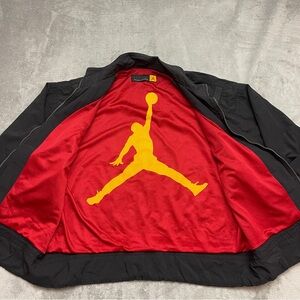 Vintage 90's Nike Jordan Jumpman Black Jacket Gold Jumpman logo Red Liner Size L
